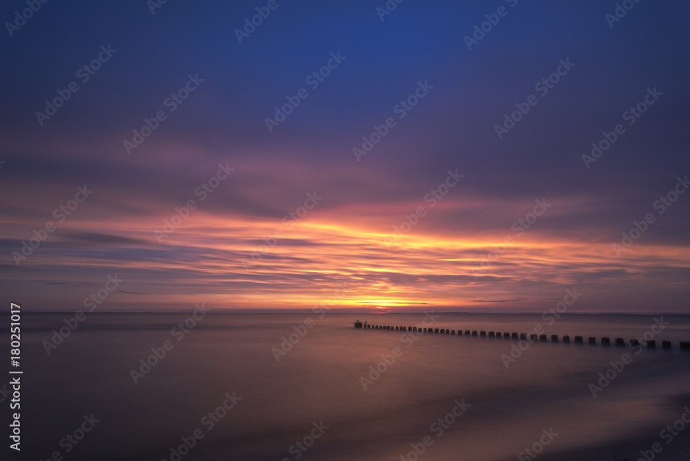 Colorful sunrise over the sea. Nature composition.