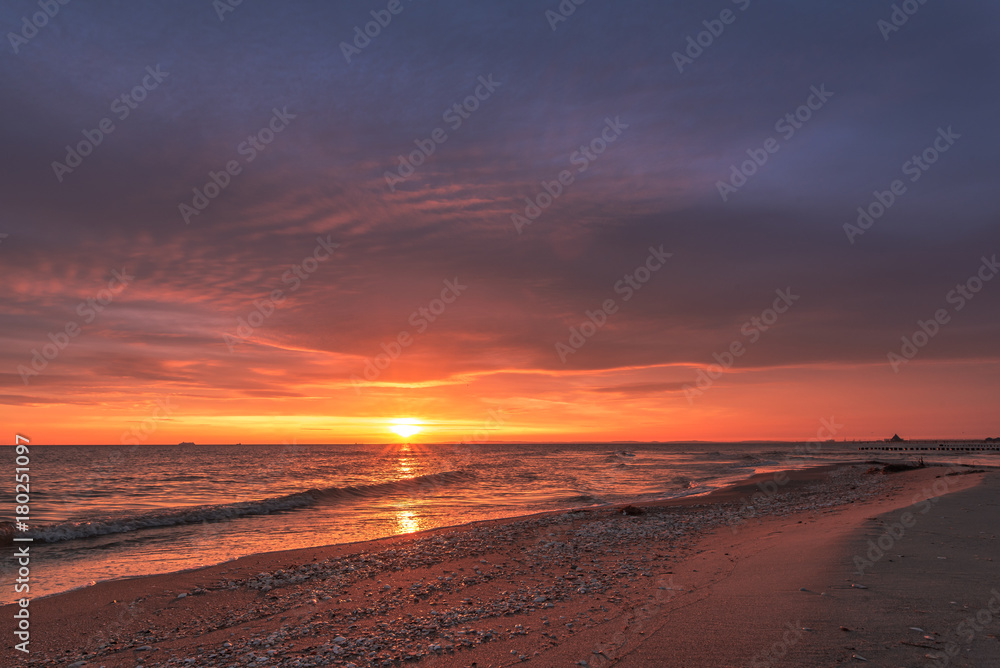 Colorful sunrise over the sea. Nature composition.
