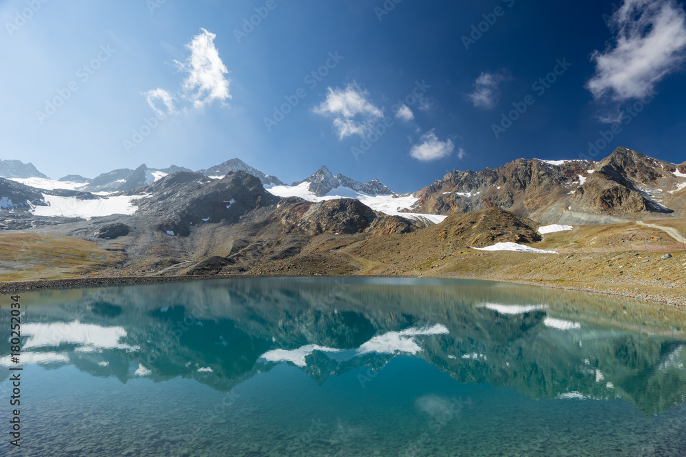 Mountains and peaks landscape. Stubaier Gletscher covered with glaciers and snow, natural environment. Hiking in the Stubai Alps. Ski resort in Tirol, Austria, Europe