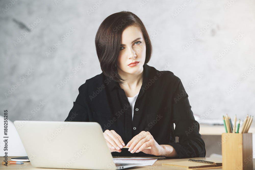 Young white businesswoman working on project Young white businesswoman working on project