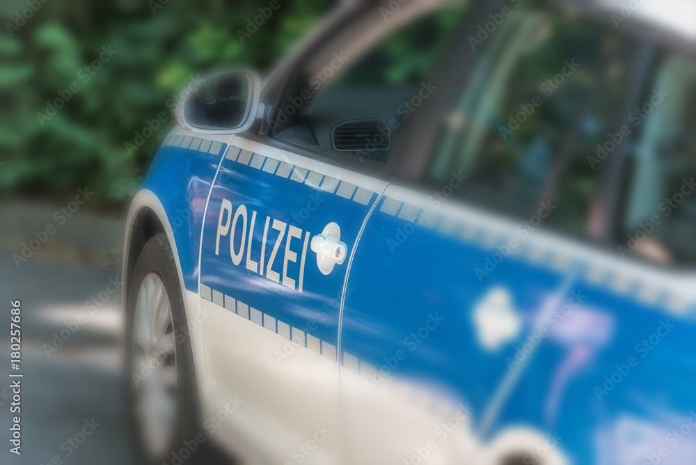 Obraz premium Exterior view of police car parked at street - Spot view