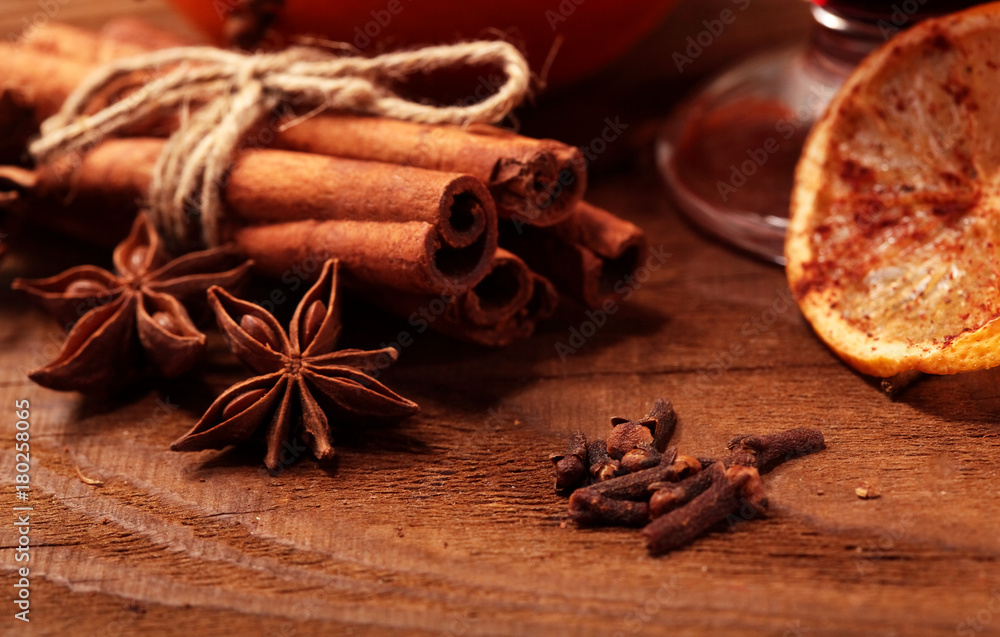 cinnamon stick and star anise spice on wooden background macro. cinnamon stick and star anise spice on wooden background macro.