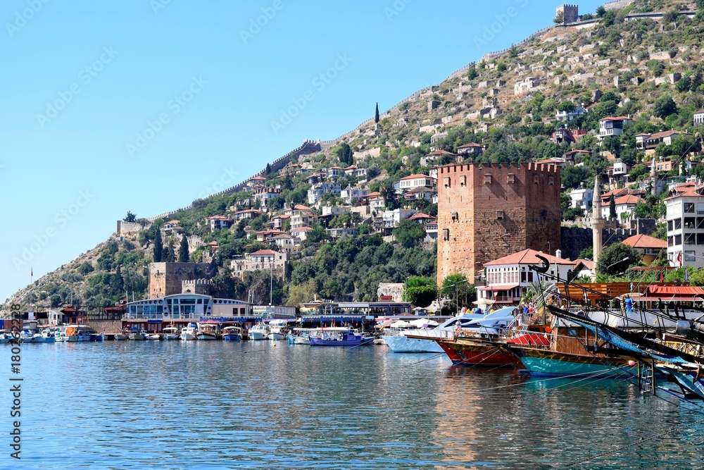 Red tower in Turkey. Antique tower Kizil Kule in Alanya.