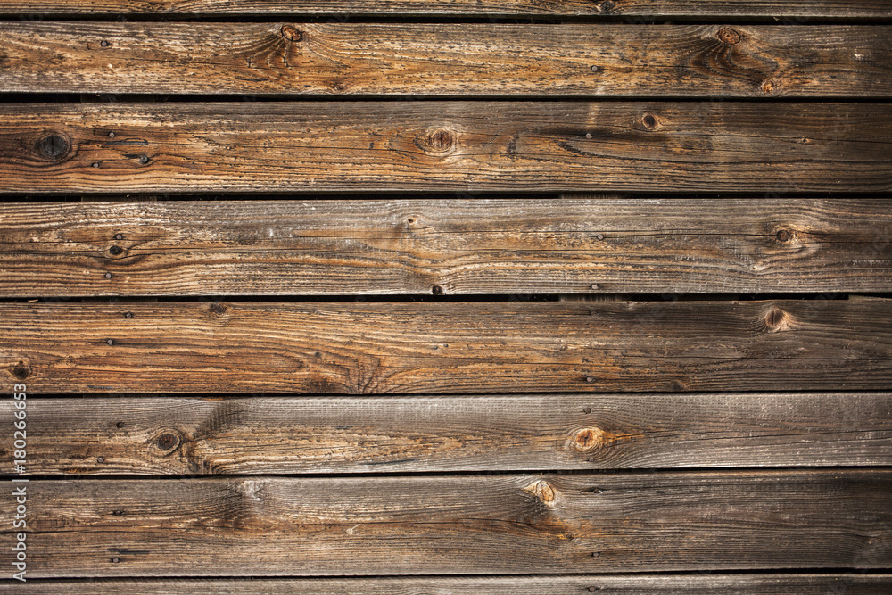 Old weathered planks texture with rusty nails.