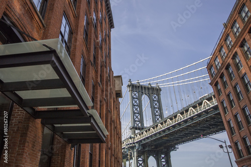 Fototapeta Naklejka Na Ścianę i Meble -  Brick wall buildings and Manhattan Bridge in Brooklyn New York City, United States