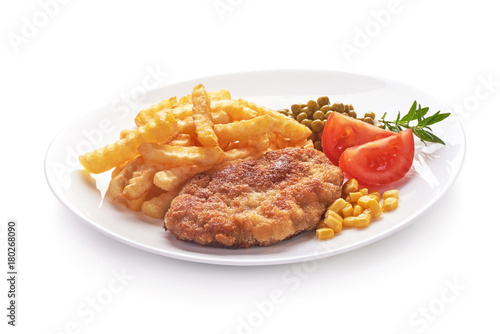 Wiener schnitzel with potato fries, isolated on white background.