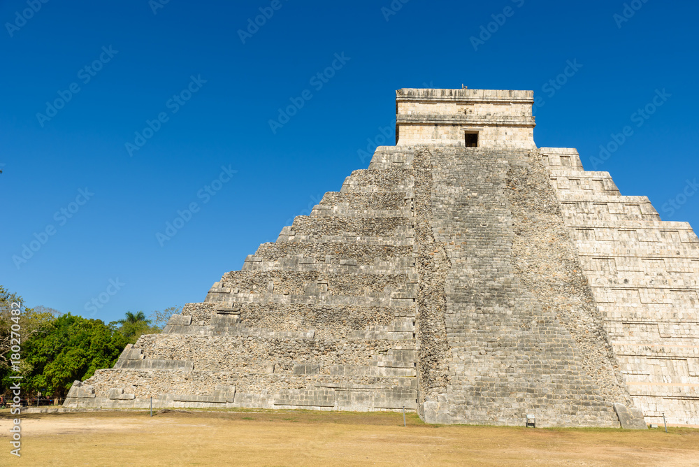 Chichen Itza - El Castillo Pyramid - Ancient Maya Temple Ruins in Yucatan, Mexico Chichen Itza - El Castillo Pyramid - Ancient Maya Temple Ruins in Yucatan, Mexico
