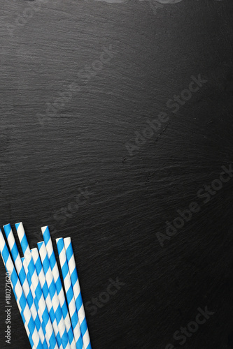 Background with striped cocktail straw