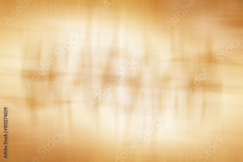 abstract orange background with stripes and light and dark spots