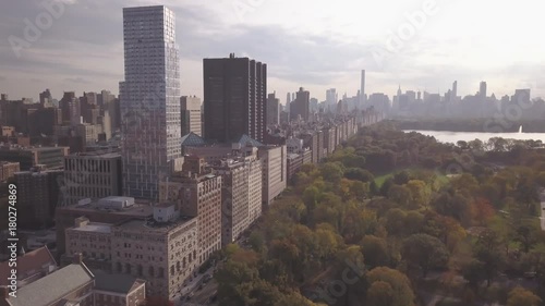 faster flying south over Central Park facing 5th Avenue