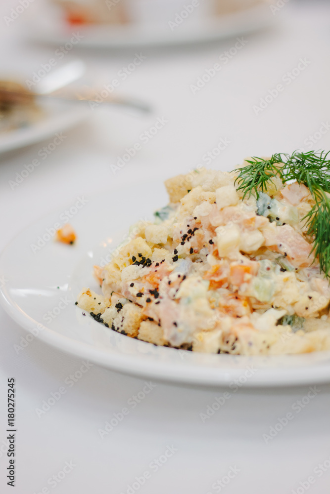 Russian salad olivie for new year or christmas celebration. Russian salad olivie for new year or christmas celebration.