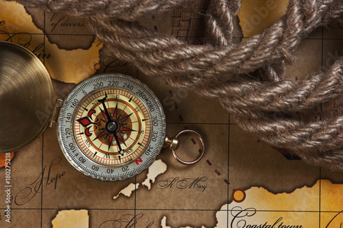 compass and rope on map