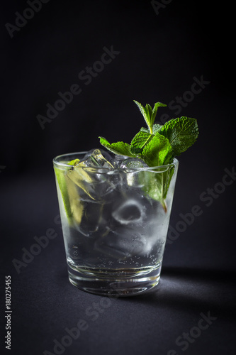 Fresh coctail drink on black background