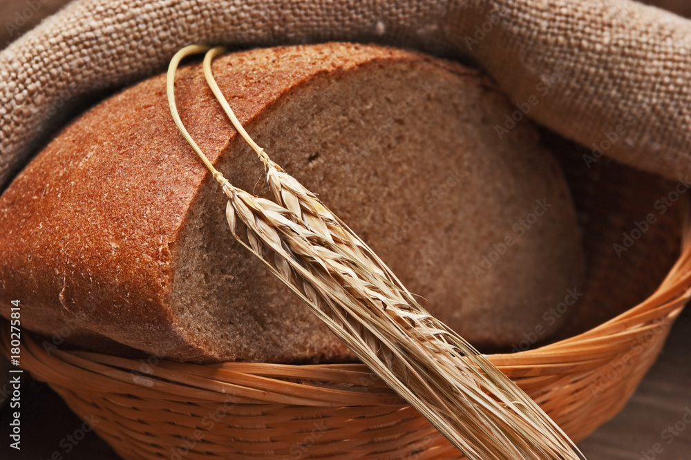 rye bread, and corn on a wooden table