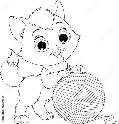 funny kitten with a ball of threads.