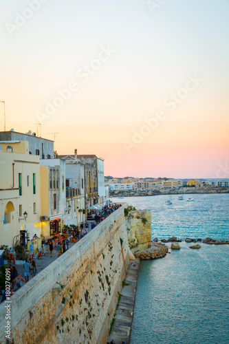 OTRANTO, ITALY - AUGUST 23, 2017 - panoramic view from the old town at sunset during turistic season