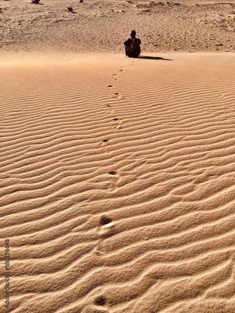 man on the dunes of Corralejo,Fuerteventura,Canary islands, Spain