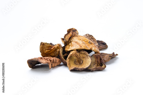 Dried mushrooms on a white background closeup. Boletus, orange-cap boletus.