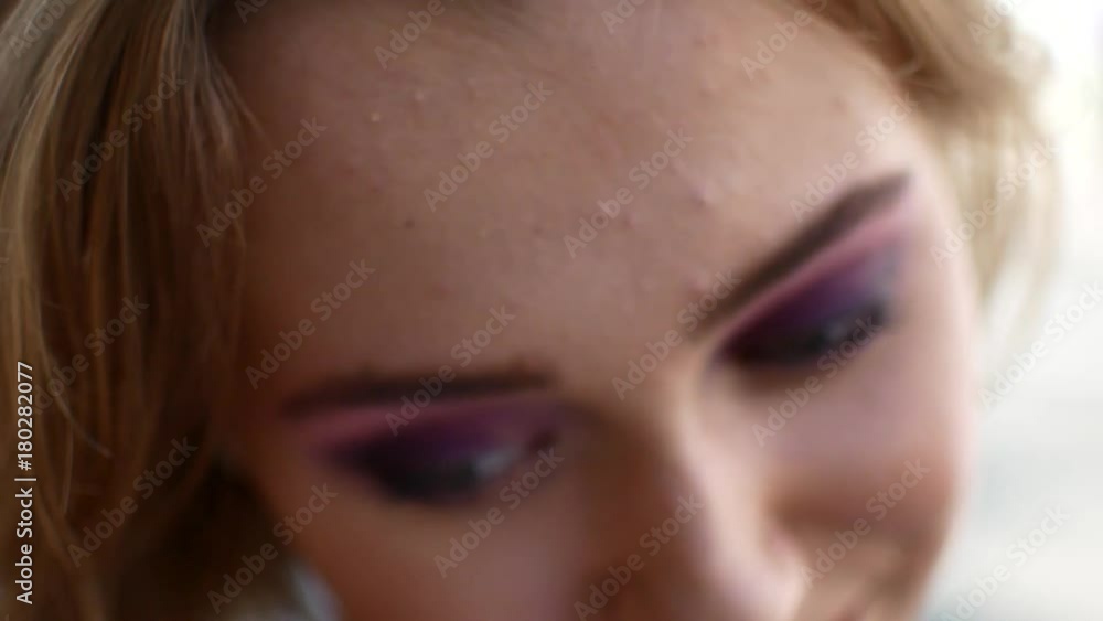 Beautiful portrait of a girl. Video in slow motion. A woman with a beautiful make-up Beautiful portrait of a girl. Video in slow motion. A woman with a beautiful make-up