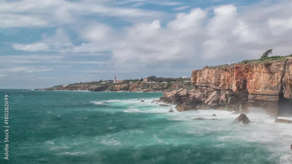 Dangerous ocean waves crash into cliff, Devil Mouth (Boca do Inferno), Portugal