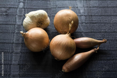 a fresh whole onion isolated on the black background
