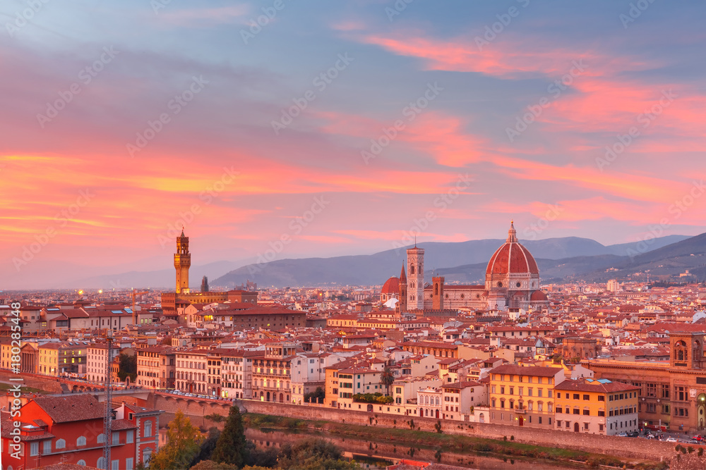 Duomo Santa Maria Del Fiore and tower of Palazzo Vecchio at gorgeous sunset from Piazzale Michelangelo in Florence, Tuscany, Italy