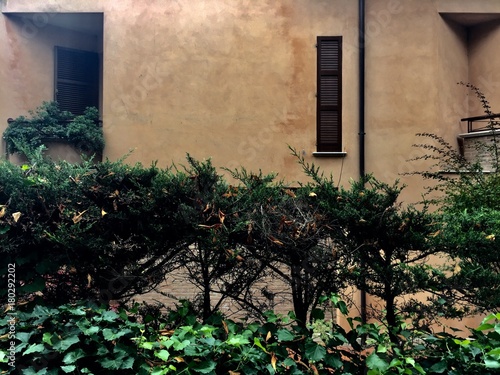 Facade of a building in the nature (Fano, Italy)