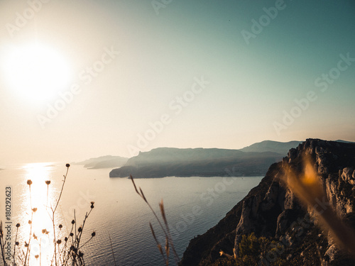 Looking over the mediterranean sea at sunset photo