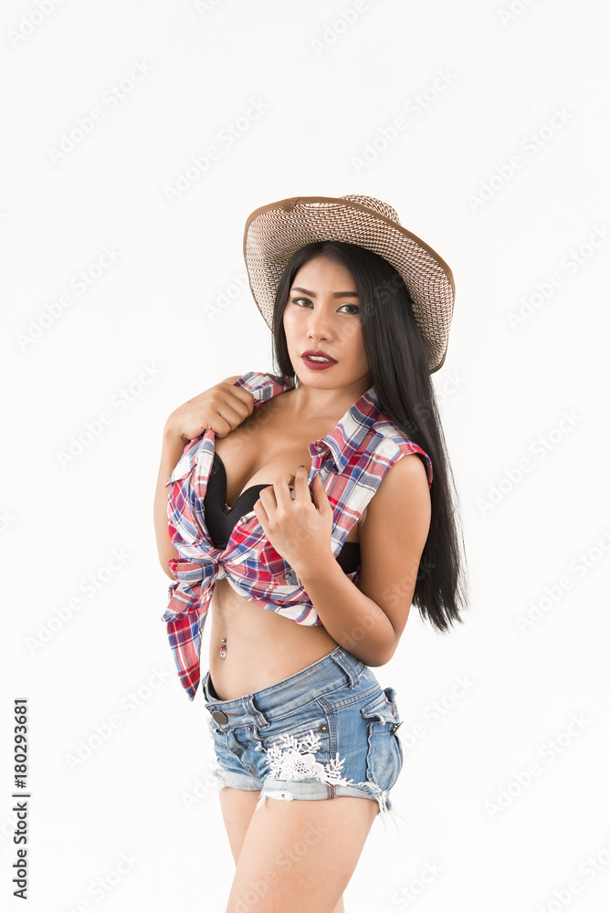 Portrait of asian sexy woman in cowgirl style pose for take a photo on  white wall,Beauty and fashion concept Stock Photo | Adobe Stock
