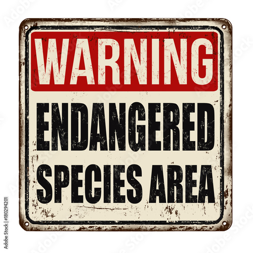 Warning endangered species area vintage rusty metal sign