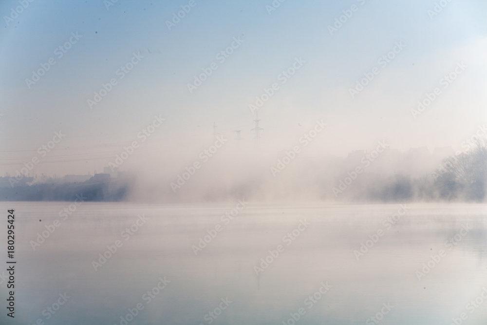 Fototapeta premium Morning on the river early morning reeds mist fog and water surface on the river