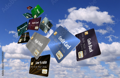 Choosing the right credit card is the theme of this illustration that includes cash back card, air miles rewards card, low interest rate card, high limit card, no annual fee card etc. photo