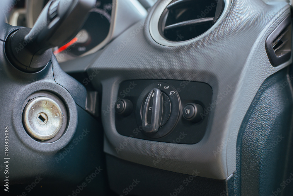 Fototapeta premium Light switch in car,close up
