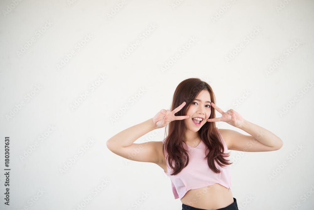 Beauty woman pose for take a photos on white background,fashion modern of female,portrait of lifestyle of sexy lady,pink dress,show two fingers,thai girl Beauty woman pose for take a photos on white background,fashion modern of female,portrait of lifestyle of sexy lady,pink dress,show two fingers,thai girl