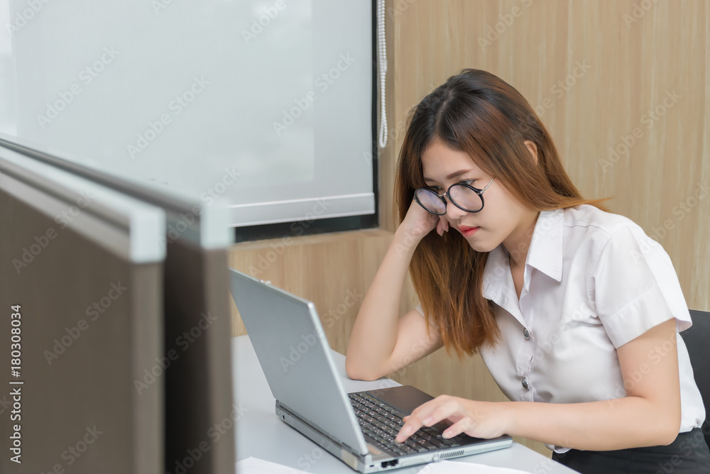 Secretary working for boss,Asian beautiful businesswoman think work in the office,vintage style,dark tone,thailand people Secretary working for boss,Asian beautiful businesswoman think work in the office,vintage style,dark tone,thailand people