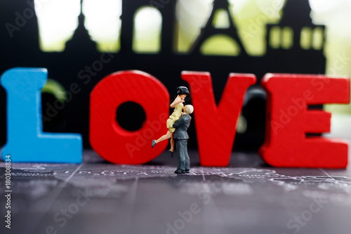 Miniature people Couple Lover standing with word "LOVE", lovely concept..