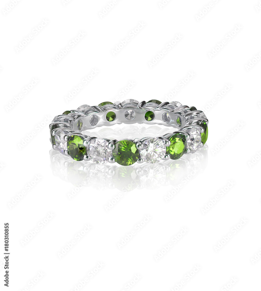 green emerald and diamond wedding band ring isolated on white