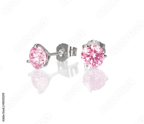 Pink diamond gemstone stud earrings isolated on white with a reflection