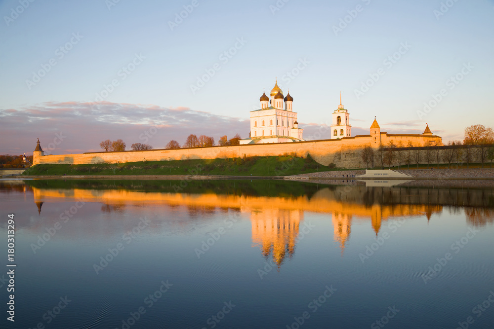 The Pskov Kremlin in the rays of the setting sun on October evening. Russia