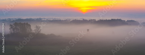 hunting tower in beautiful misty scenery