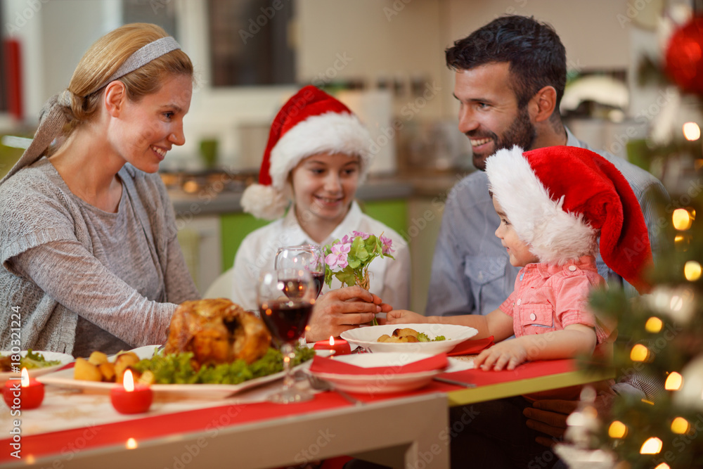 Christmas time –  Family enjoying on Christmas dinner.