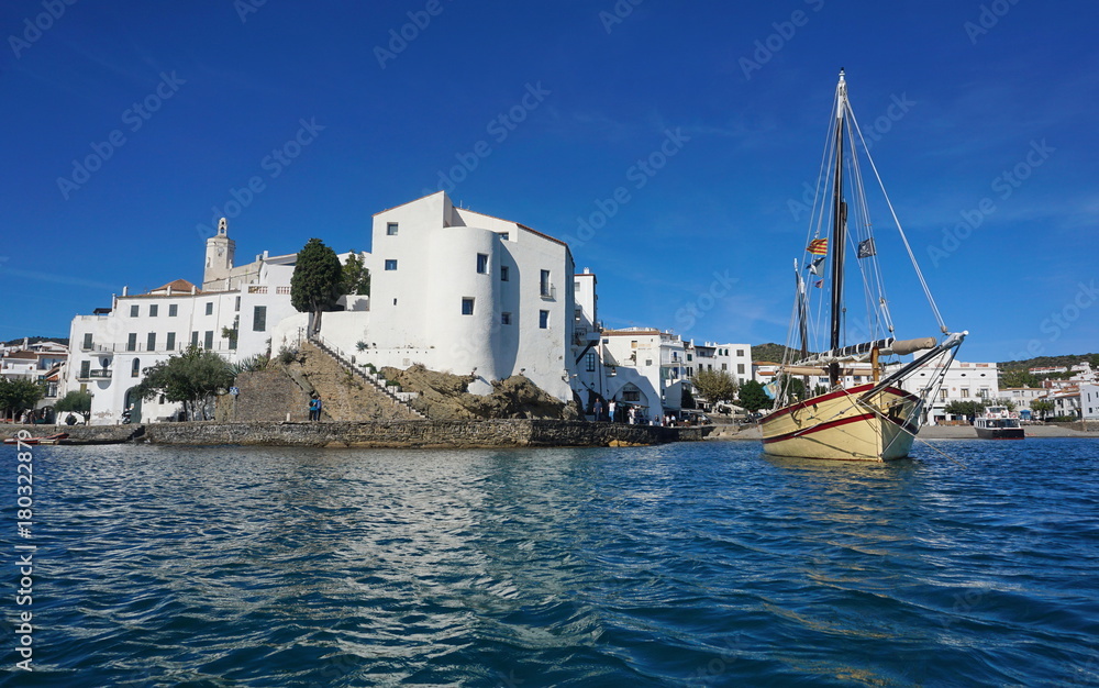 Spain coastal village of Cadaques with a traditional boat, Mediterranean sea, Costa Brava, Catalonia