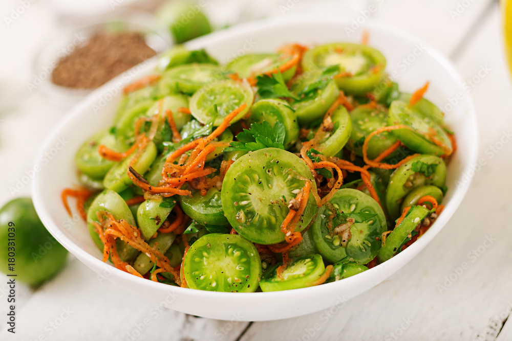Korean salad from green tomatoes and carrots. Korean salad from green tomatoes and carrots.