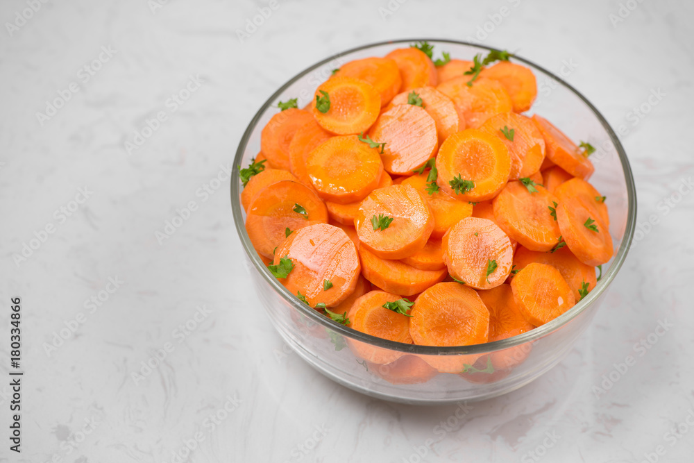 Chopped carrot slices. Fresh raw peeled carrot slice in bowl. Chopped carrot slices. Fresh raw peeled carrot slice in bowl.
