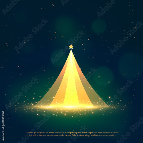 glowing christmas tree design on blue background