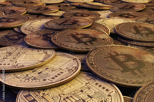 Golden Bitcoins. New virtual money. 3d rendering. photo