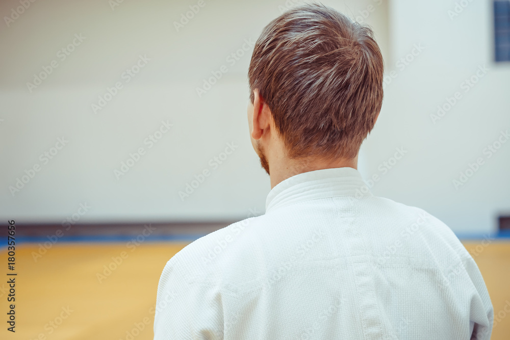 Fototapeta premium man in kimono standing with her back