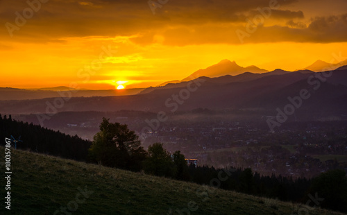 Sunset over peak Havran and Zakopane in Tatra mountains from Koscielisko  Poland