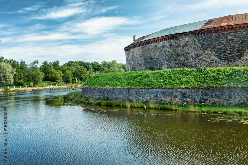 Old fortress on the river bank, beautiful landscape Old fortress on the river bank, beautiful landscape