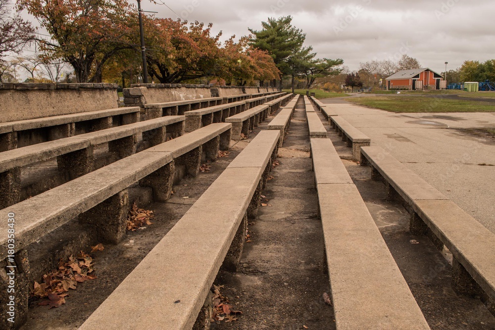 Old stone bleachers in a park setting